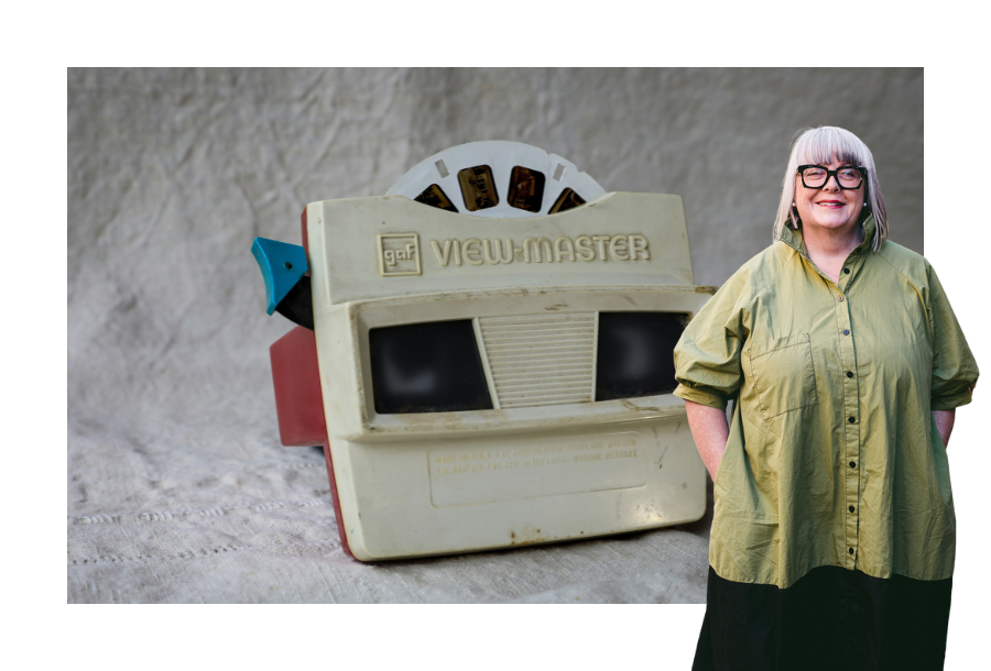 Pictured, Anthea Taylor standing in front of a stock picture of an old-school picture film maker.